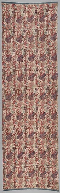 Early eighteenth-century Indian painted and dyed cotton chintz with red flowers and blue-green foliage